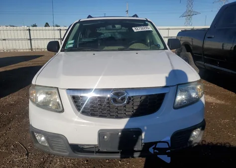 2008 Mazda Tribute I z USA, uszkodzony, nr VIN 4F2CZ02Z88KM23617